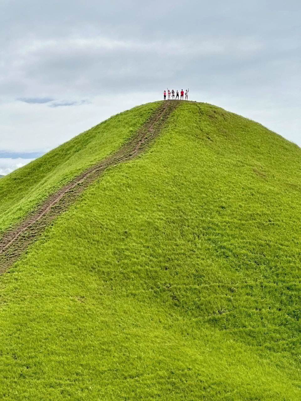 View of a group if people on a hill in Phou Hua Lon hills in Laos